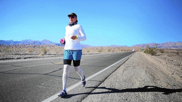 Lisa Smith-Batchen runs the "Badwater Quad," a 584-mile route from Badwater Basin in Death Valley to Mt. Whitney and back, twice. (Jonathan Young)